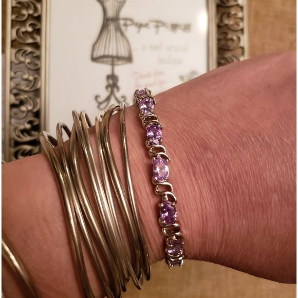 Jewelry - 18KWGP Tanzanite tennis bracelet